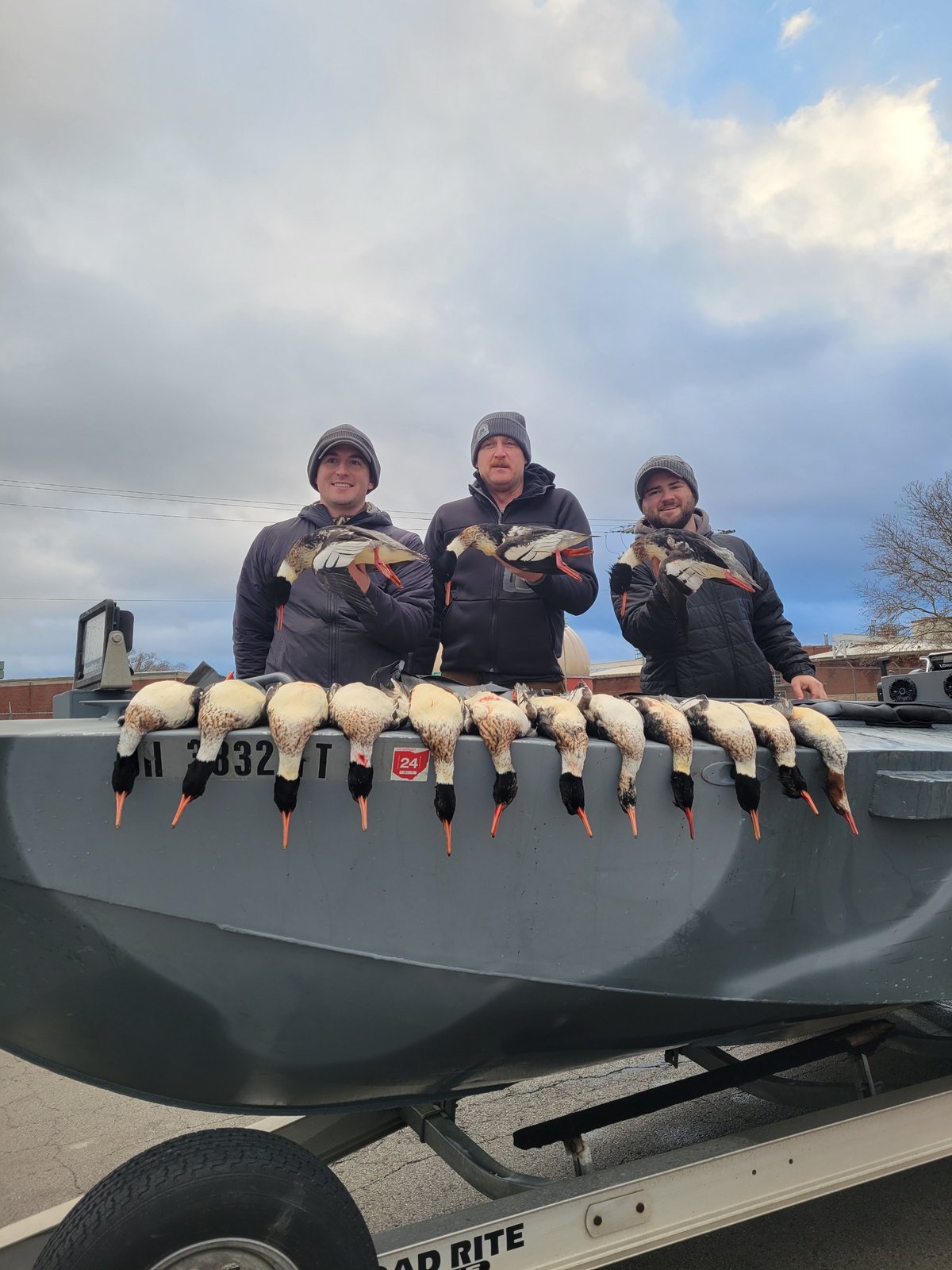 Hunt 41 collectors on Lake Erie holding a full line of Red-Breasted Merganser drakes taken on a species-specific collector hunt